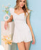 EXPLORING NEW CITIES WOVEN SKORT ROMPER