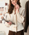 CHAMPAGNE WISHES TIE FRONT BLOUSE