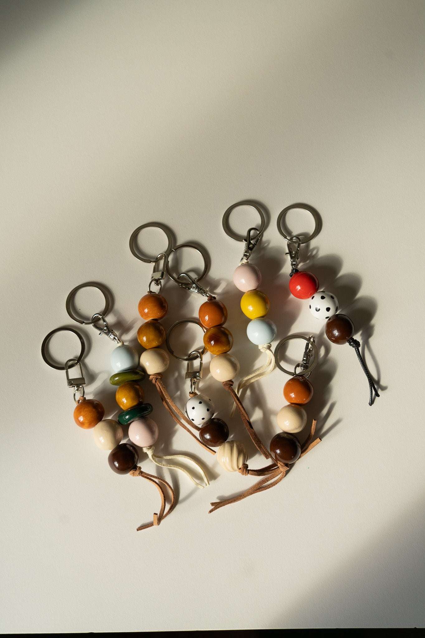 Handmade Ceramic Beaded Keychain in Brown and Green Tones