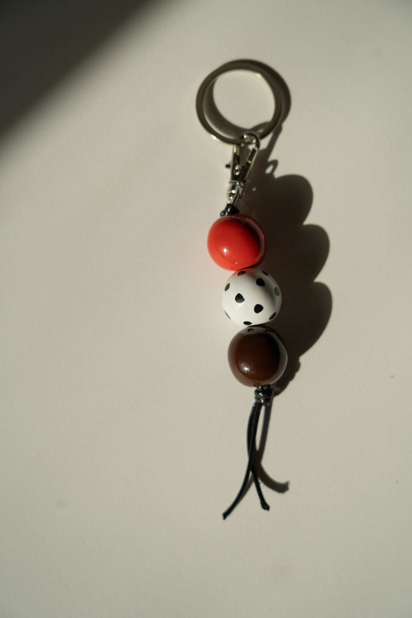 Handmade Ceramic Beaded Keychain in Brown and Red Tones