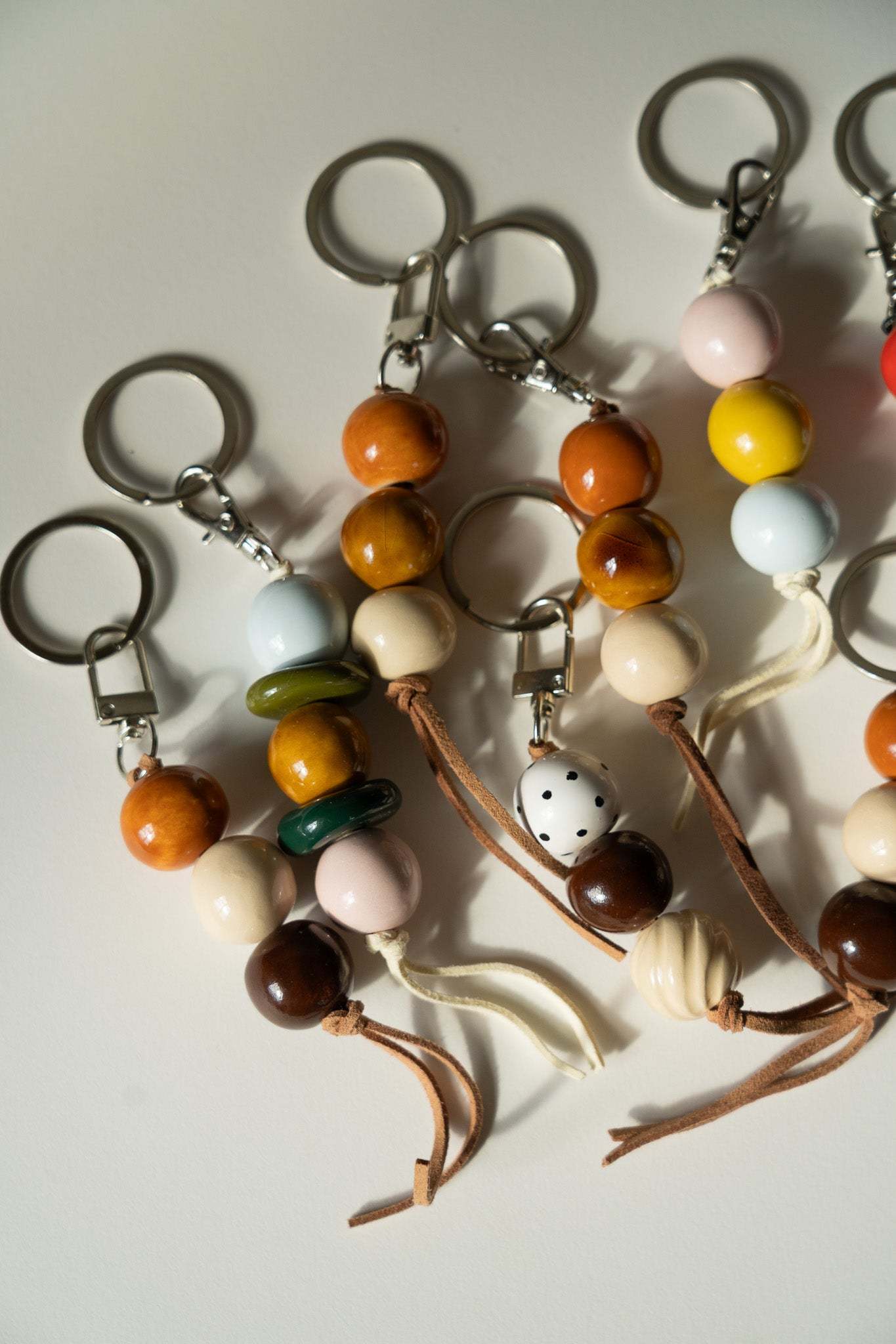 Handmade Ceramic Beaded Keychain in Brown and Red Tones