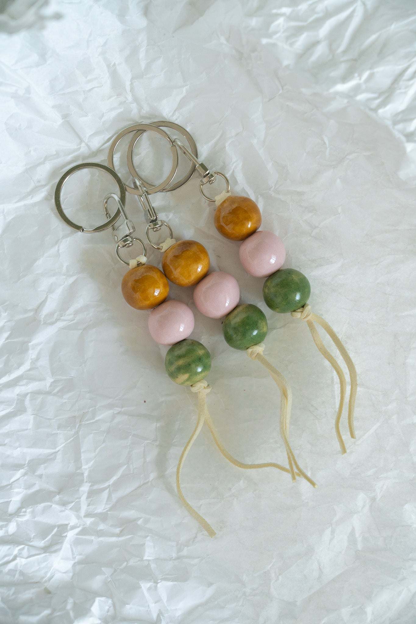 Handmade Ceramic Keychain in Warm Contrast Tones