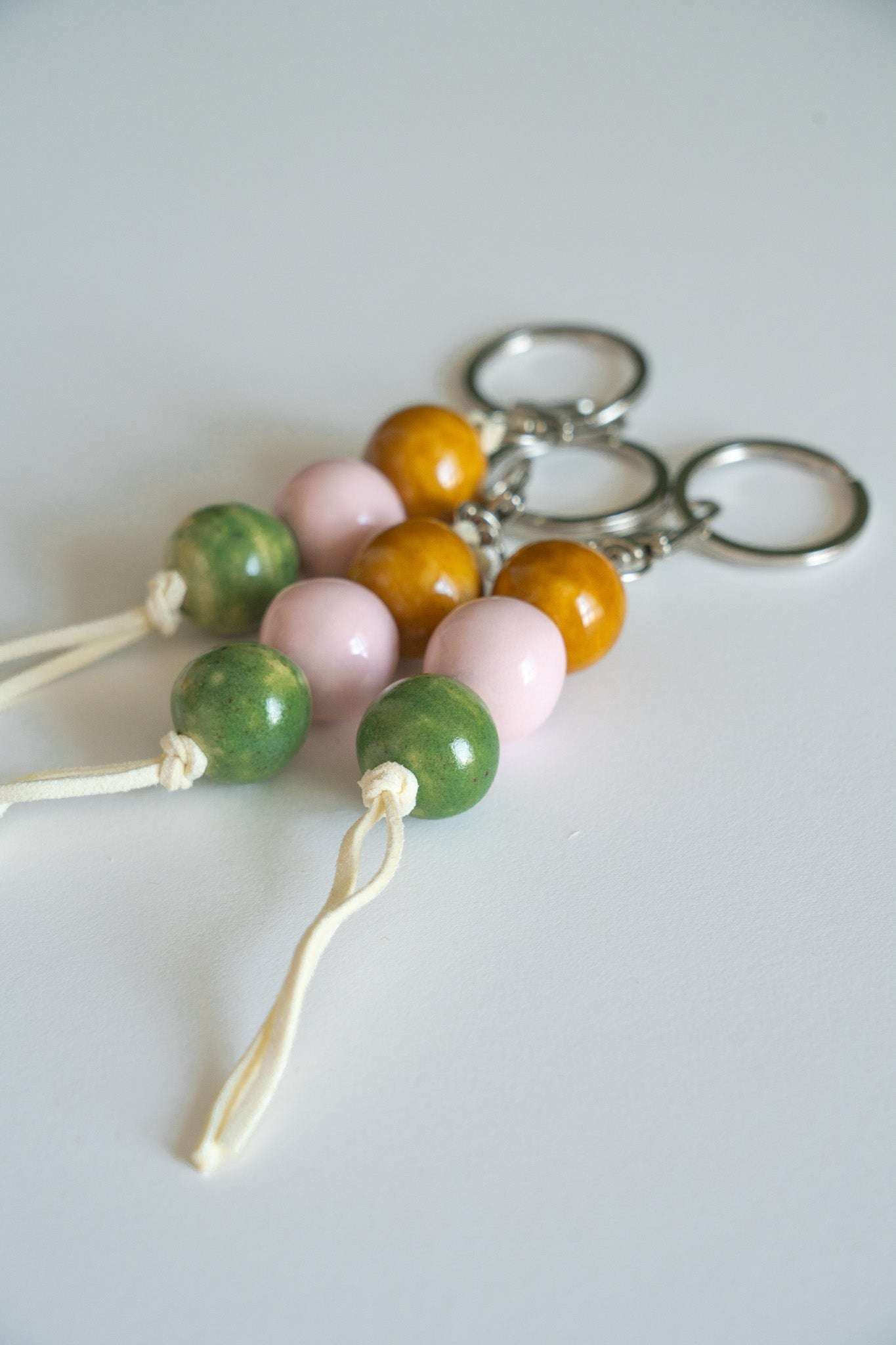 Handmade Ceramic Keychain in Warm Contrast Tones