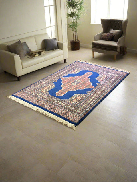 Hand-Knotted Pakistani Wool Rug, Tribal/Floral Design, size 4' 1" x 6' 1"